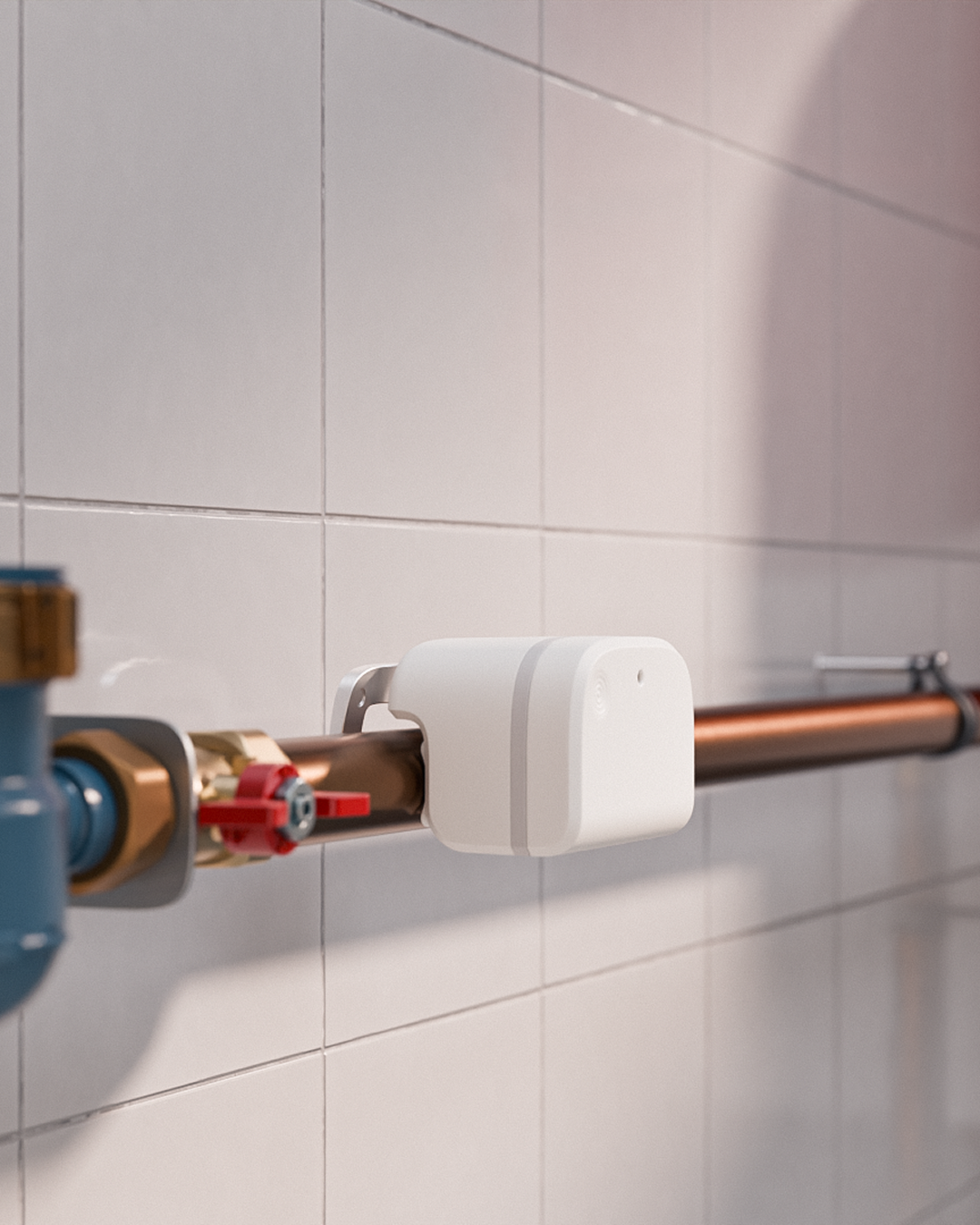 Water Grip mounted on a copper pipe in a white-tiled room